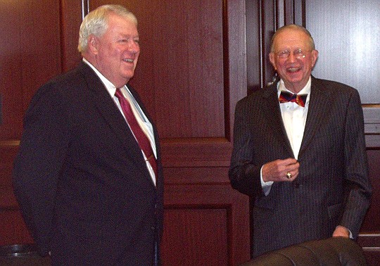 Chief Judge Donald Moran, left, and attorney James F. Moseley Sr. greet participants in the American College of Trial Lawyers practice seminar.