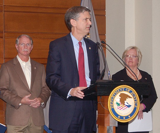 From left, Jacksonville Sheriff John Rutherford, acting United States Attorney for the Middle District of Florida Lee Bentley III and FBI Special Agent Michelle Klimt at the news conference Monday announcing the indictment of Aaron Richardson.