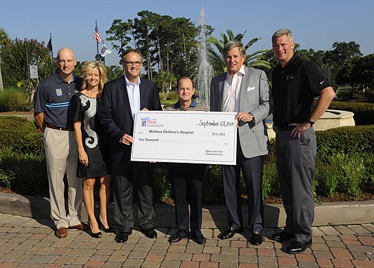 From left, Jim and Tabitha Furyk; Hugh Greene, CEO of Baptist Health; David Brown, CEO of Web.com; Bill Calfee, president of the Web.com Tour; and Matt Rapp, executive director of the Web.com Tour Championship.