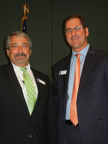 Leadership Jacksonville President Stephen Goldman (right) with Jim Bailey, publisher of the Daily Record.
