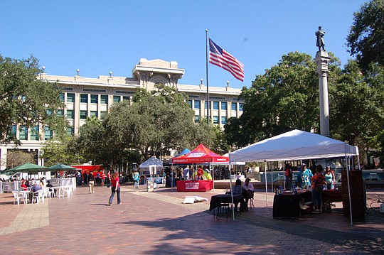 Sunshine, mild temperature and a breeze made the city's Downtown Office Party at Hemming Plaza the midday destination for many people.