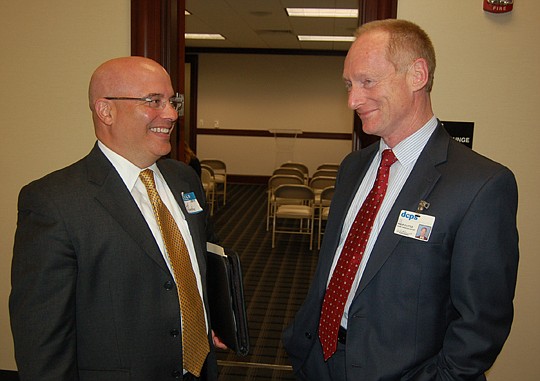 Scott Costantino, co-chair of the American Board of Trial Advocates Teachers' Law School in Jacksonville, and Philip Little, Duval County Public Schools grants coordinator.