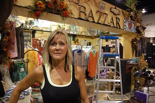 Suzanne Franklin from Hilliard was setting up her "Zans Bazzar" Wednesday at the Southern Women's Show.