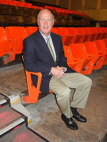 A former dog track was renovated to accommodate the KIPP Jacksonville Schools. Baker sits in the auditorium, which formerly was the grandstand.