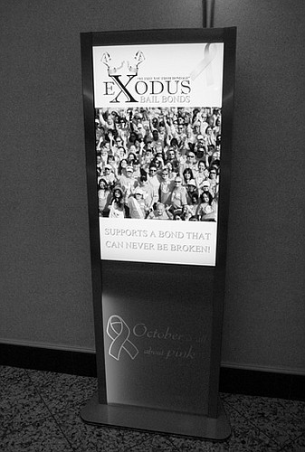 This advertising kiosk was ordered removed from City Hall by the Office of General Counsel after an inquiry from the Daily Record.