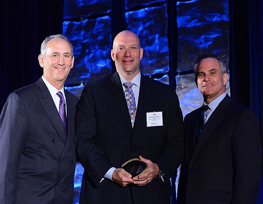 From left,  Florida Hospital Association Board Chair Steven D. Sonenreich; President/CEO of Mount Sinai Medical Center, St. Vincent's Medical Center Southside President Kyle Sanders; and association President Bruce Rueben with the Celebration of Servi...