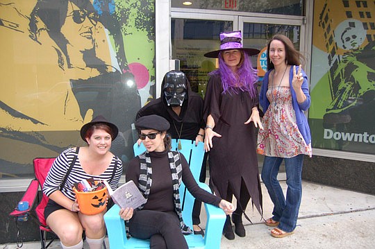 Photos by Max Marbut - The Downtown Vision Inc. trick-or-treat team, from left, Liz Grebe, Katherine Hardwick, Jennifer Hewitt-Apperson, Terry Lorince and Sarah Henderson.