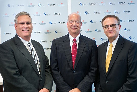 From left, Southeast Georgia Health System President and CEO Gary R. Colberg, Flagler Hospital President and CEO Joseph Gordy and Baptist Health President and CEO A. Hugh Greene. The three said yesterday they are exploring options for their hospitals ...