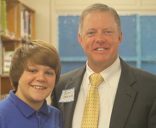 Arlington Middle School eighth-grader Josh Railey, a participant in Achievers for Life, with his mentor John Daigle.