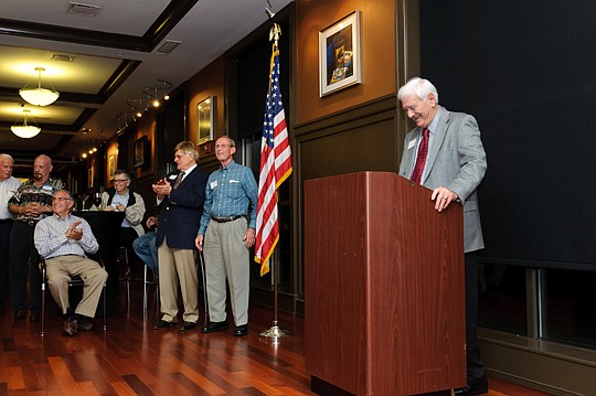 The Jaycees Roosters, an organization of former presidents and lifetime members of the Jacksonville Jaycees, held a reunion Tuesday. Henry Cook enjoys a light moment addressing those in attendance.
