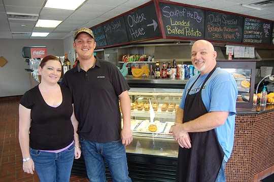 From left, Cheyanne York, Josh Crews and Blair Epley at The Corner Diner at Forsyth and Ocean streets.
