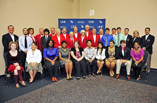 The Players Championship volunteer leadership groups, the Red Coats and Blue Coats, attended the University of North Florida's First Generation Scholars Luncheon to celebrate the recipients of the Red Coat Scholarships, part of The Players Championshi...