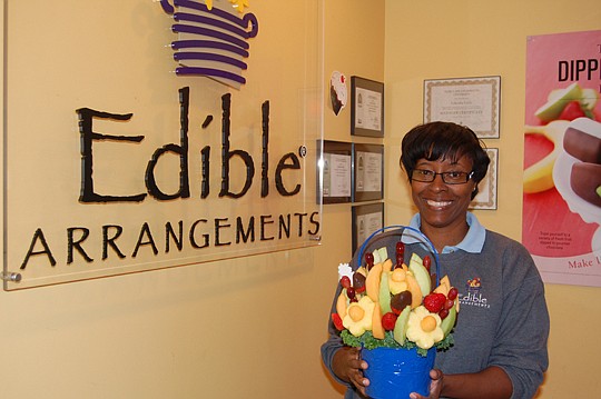 Lauren Little is considering more locations for Edible Arrangements. The two she owns in Jacksonville produce about $1 million a year in revenue.