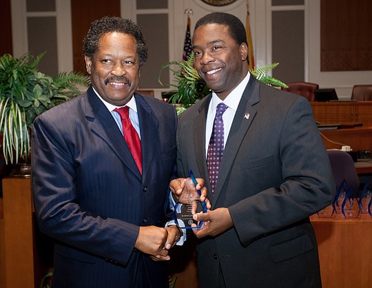 Chester Aikens (left) was in the inaugural class to receive a Trailblazer Award from Mayor Alvin Brown. The awards, presented in March, honored African-Americans who made changes in fields in business, education and public policy.