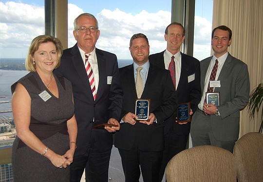 From left, U.S. District Judge Marcia Morales Howard and attorneys Frank Tassone, Jesse Dreicer, Lawrence J. Hamilton II and Jameson B. Rice.