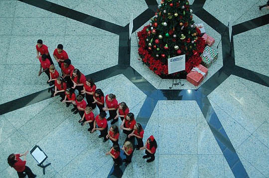 The chorus from First Baptist Church Academy performed holiday music Monday in the atrium at City Hall, The city's seasonal entertainment program will continue at 12:15 p.m. Wednesday when flutist Linda Witsell is scheduled to perform.