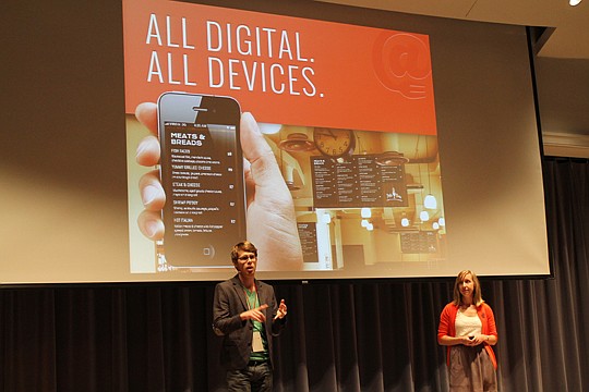 Jeff Charette (left) and Emily Charette pitch their MenuAt business during Demo Day for KYN companies Thursday night at the Main Library Downtown.