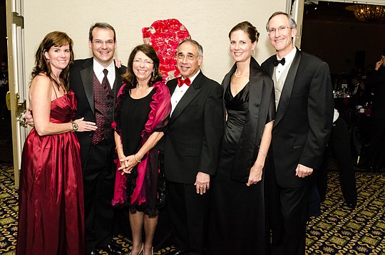 From left, Jill and Dr. Paul Chappano, Debbie and Mel Gottlieb and Ann and Ed McCarthy at the 2012 Red Rose Ball. Proceeds from this year's ball, on Feb. 14, will benefit Heart Smart, a new St. Vincent's heart wellness program.