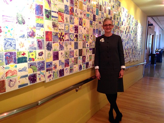 Photos by Tracy Jones - One of Hope McMath's most prized pieces in The Cummer Museum of Art & Gardens is by disabled students who visit the museum. Tiles featuring their artwork hang on a walkway at the museum, where McMath is the director.