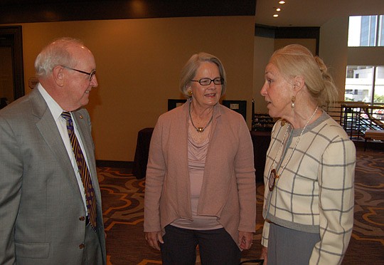 From left, Rotary Club of Jacksonville President Bill Mason, Women's Giving Alliance past President Sandy Cook and Marilyn McAfee, former U.S. ambassador to Guatemala.