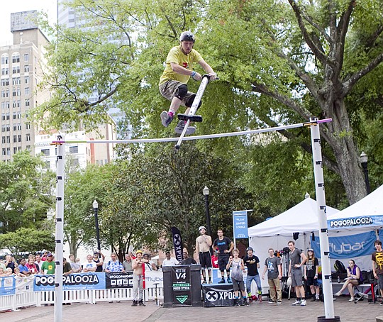 Biff Hutchinson ties the world record for high-jumping set by fellow competitor Dmitry Arsenyev when he cleared 10-feet, 1/2-inch. They were part of the two-day Pogopalooza competition at Hemming Park.