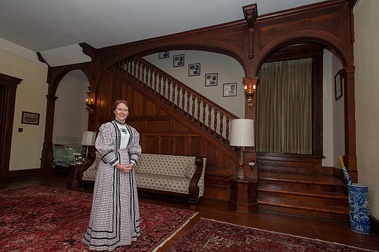 Cherri Picard welcomes guests to the Solomon Masonic Lodge at 25 E. First St. as they enter the grand foyer. It was originally the home of the Barnett family, who owned Barnett Bank. The home was part of the 37th annual Historic Springfield Tour of Ho...