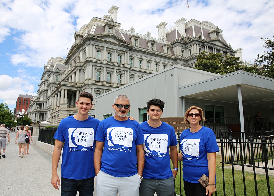 The Seslija family outside the Eisenhower Executive Office Building in Washington, D.C. From left, Leo (brother), Janko (father), Mateo (dreamer) and Sanela (mother).