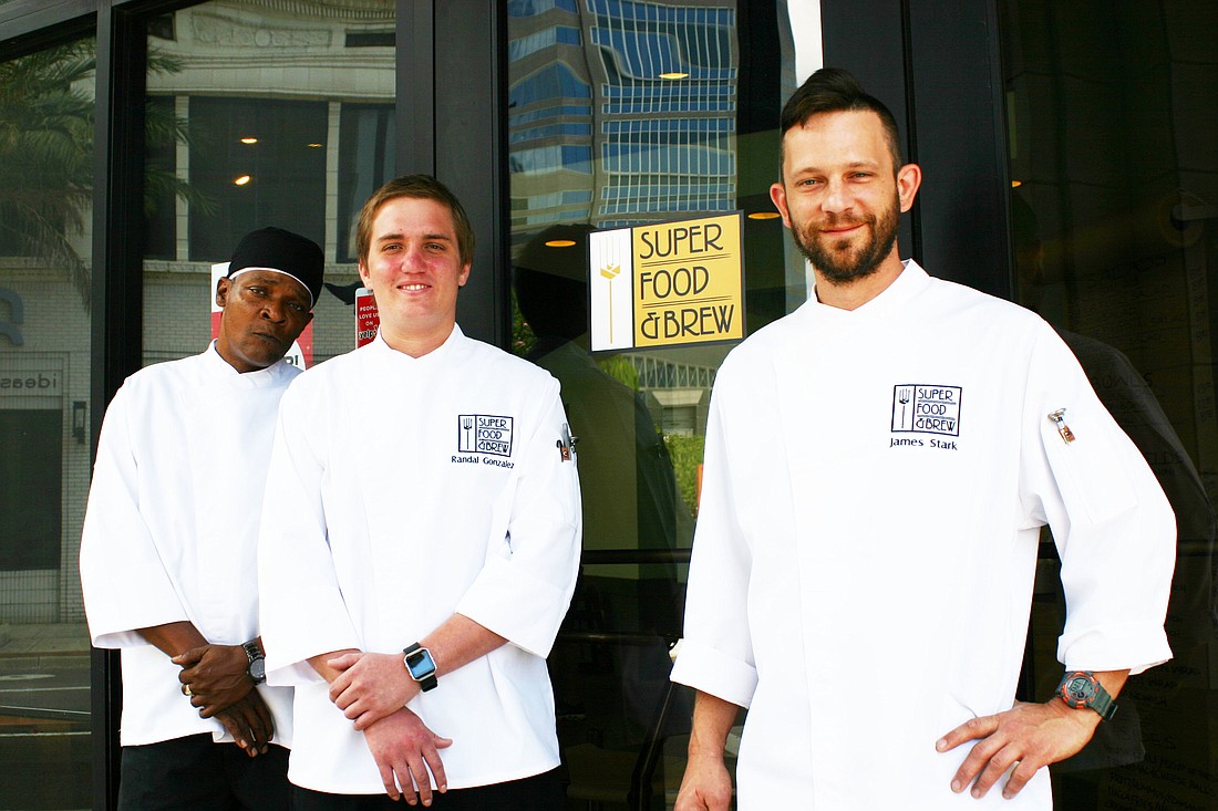 Sous Chef Mark Benson, new owner Randal Gonzalez and Executive Chef James Stark at Super Food & Brew Downtown. â€œWe have not changed the menu. We are not changing the menu. We are not changing the staff,â€ says Gonzalez.