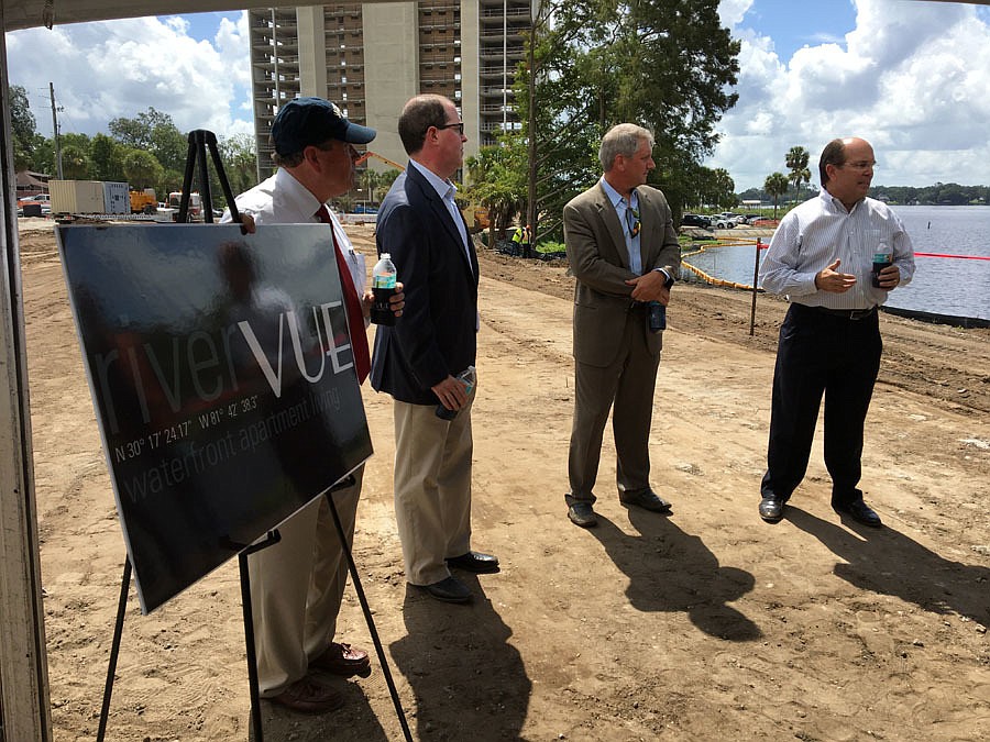 Jacksonville City Council memberJim Love, Chance Partners Principal Jeff Rosen, founder Judd Boblilin and RAP Chair Keith Holt reveal the name Wednesday of the $40 million residential development at St. Johns Ave. and Herschel St. in Avondale.