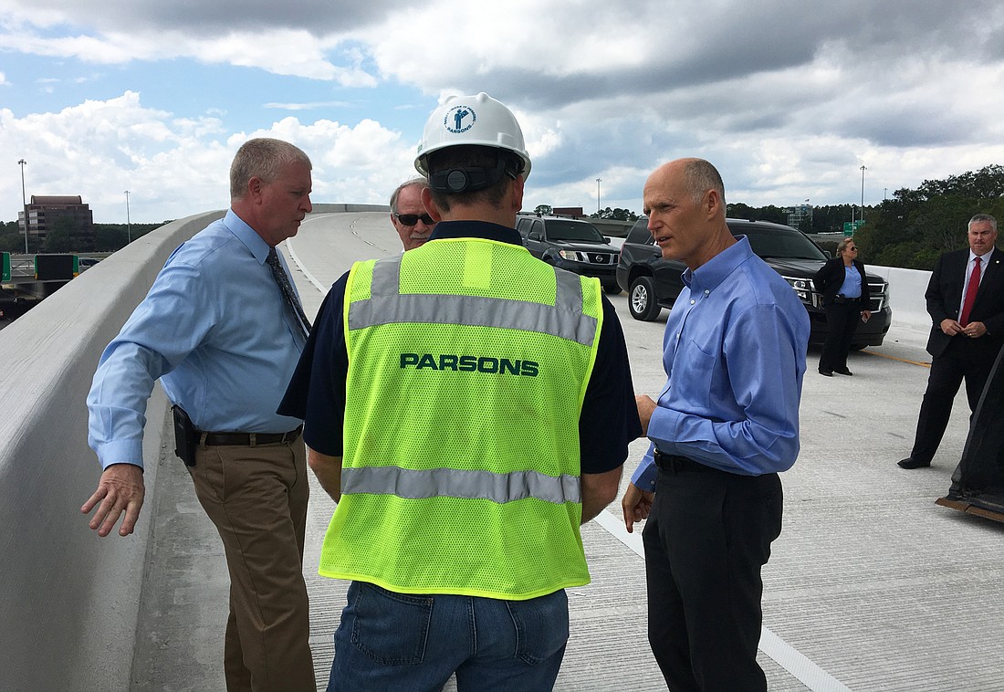 Gov. Rick Scott held a news conference Wednesday on the flyover exit ramp from Interstate 95 south to Butler Boulevard to announce it will open Wednesday.