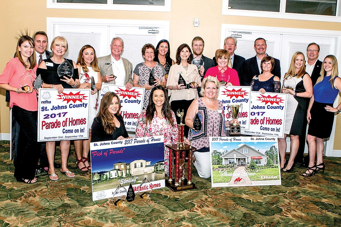 Winners in the St. Johns Parade of Homes show off their awards after the banquet  Aug. 31 at Marsh Creek Country Club in St. Augustine Beach.