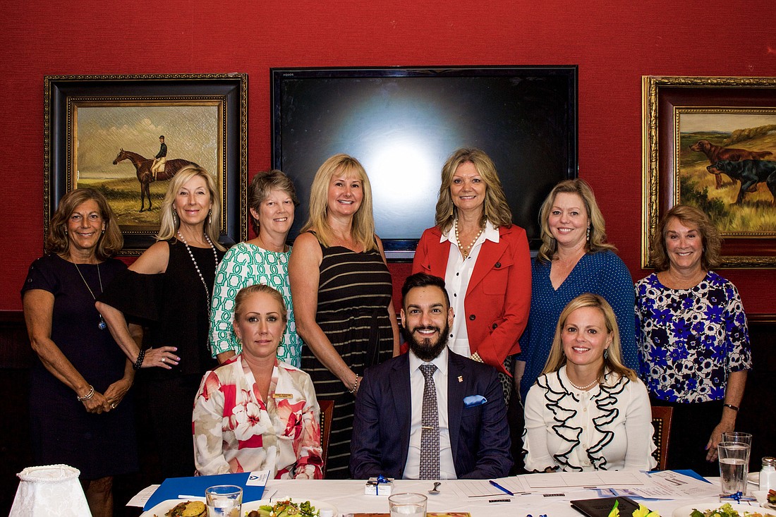 The Capital Affair Host Committee: (From left, seated) Brandy Robertson, Raul Gutierrez and Inger Geraghty. Standing: (From left) Lorie Rogan, Dany Atkinson, Mary Pat Corrigan, Leslie Gordon, Jill Storey, Melissa Ross and Barbara Potter.