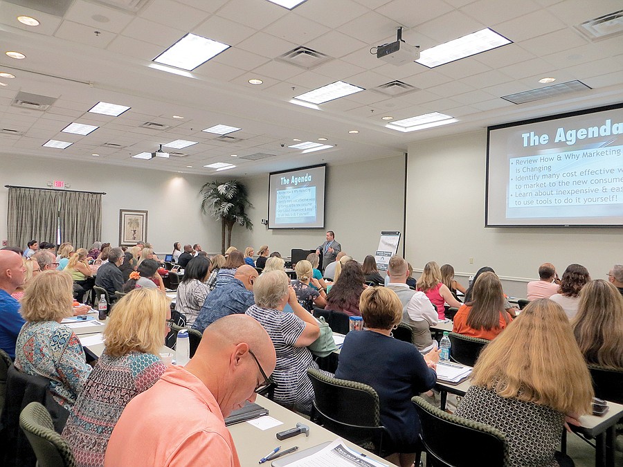 Instructor Craig Grant teaches a packed house of real estate professionals â€œHow to Market Like a Rock Starâ€ during an Aug. 3 technology course at the Northeast Florida Association of Realtors Resource Center.