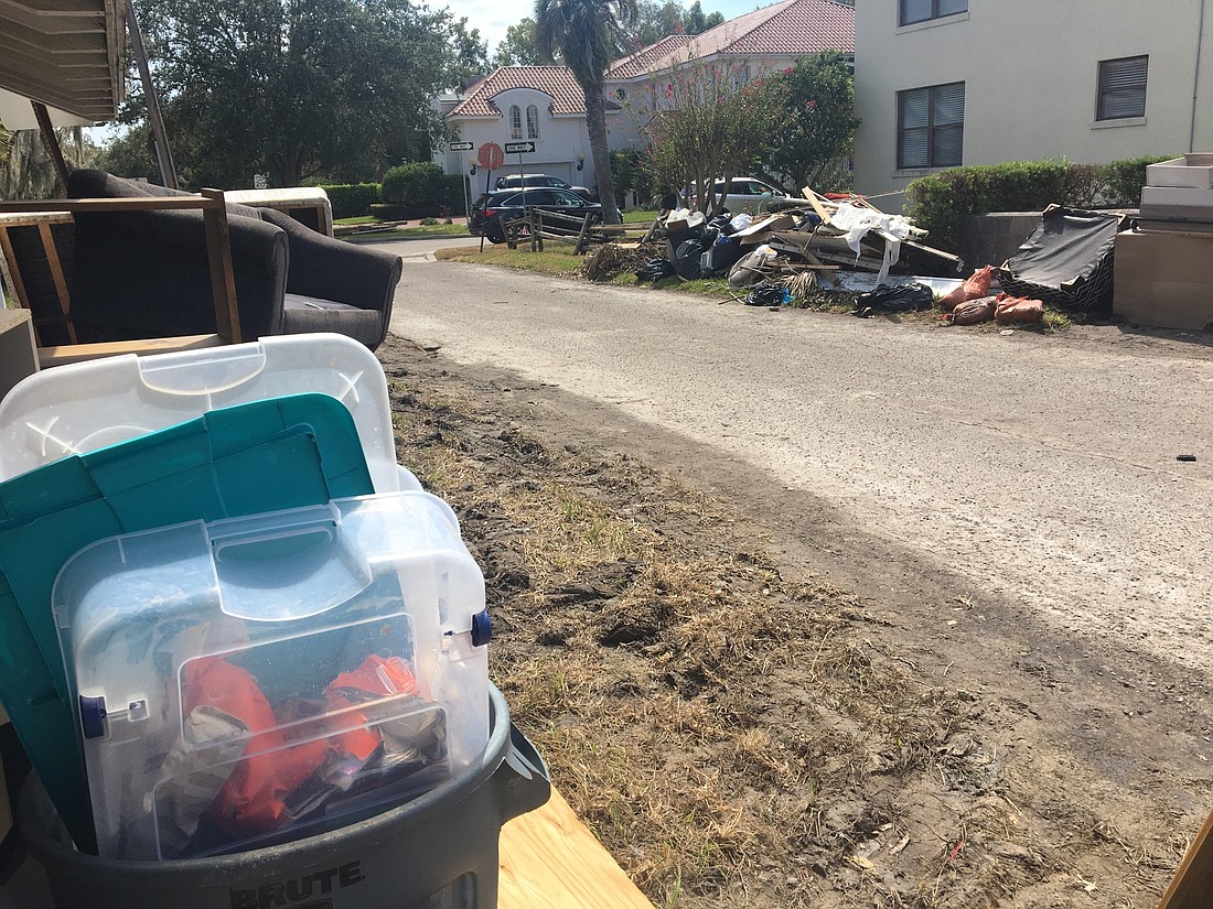 Irma debris is piled on the roadside in San Marco on Tuesday.