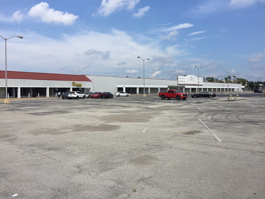 Developer Jeff Conn said he owns the bulk of the parking lot in front of the former Kmart on Beach Boulevard.