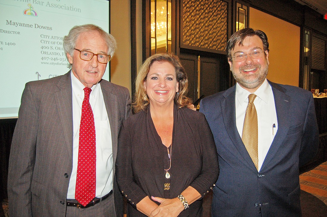 Attorney Hank Coxe, left, with Orlando City Attorney Mayanne Downs and Tad Delegal, president of The Jacksonville Bar Association.