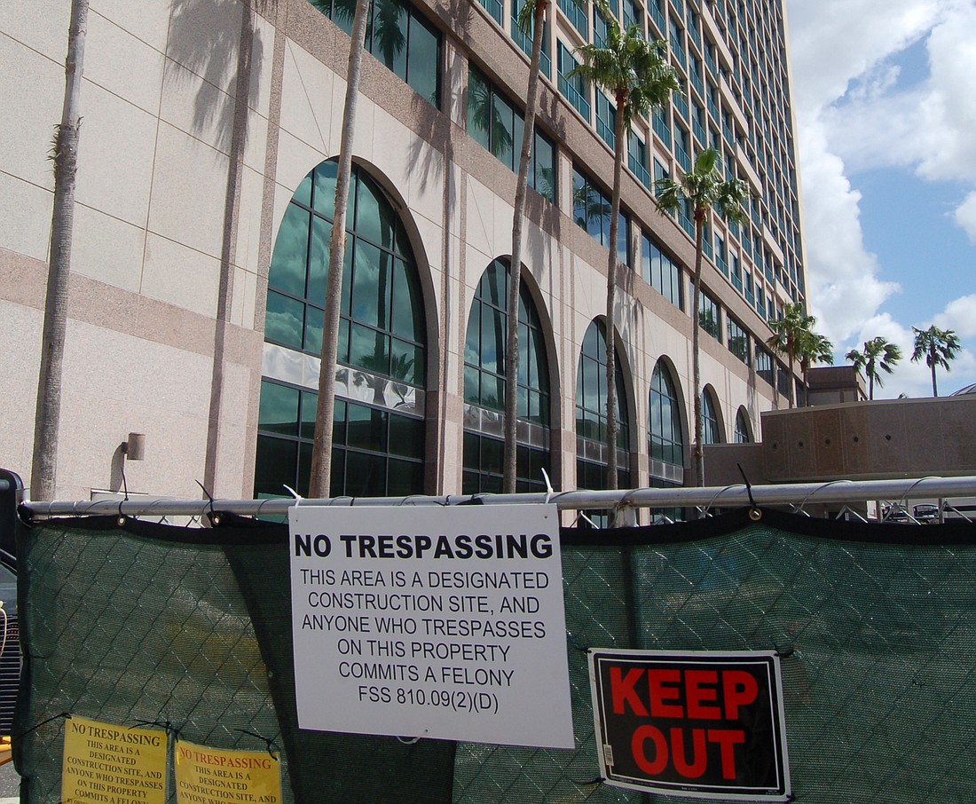 The Hyatt Regency Jacksonville Riverfront Downtown on the Northbank Riverwalk is fenced off while damage caused by Hurricane Irma is being repaired.