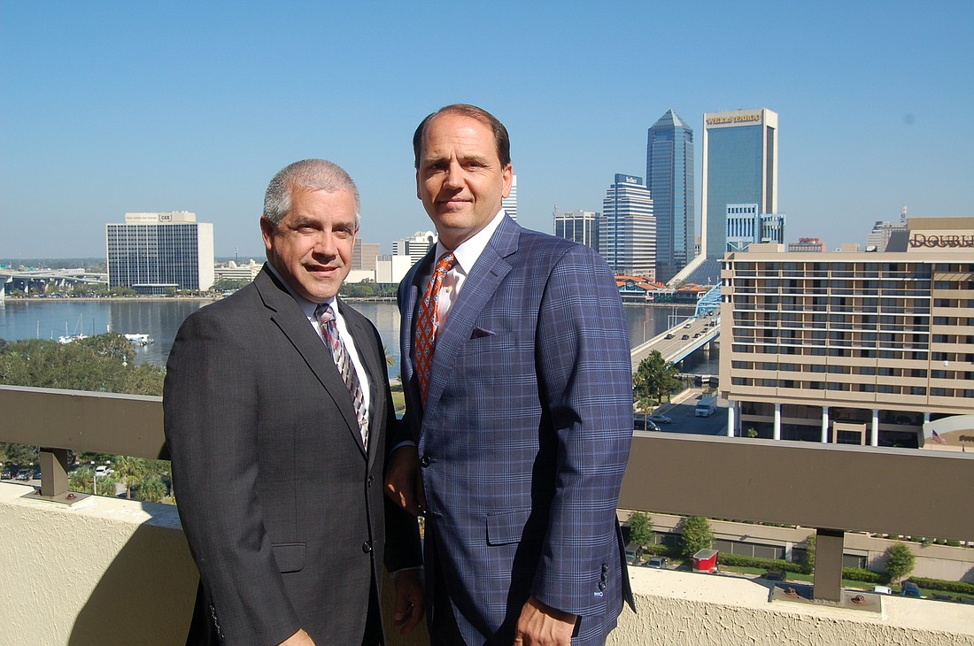 Gregg Anderson, left, and Joseph Camerlengo recently established Camerlengo & Anderson with offices in the Stein Mart Building on the Downtown Southbank.