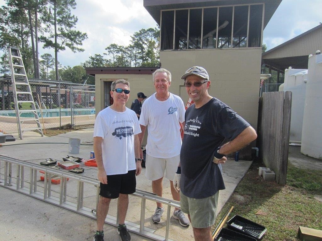 Holland & Knight attorneys attorneys Ivan Colao, Jim Main and Alan Weiss joined about 100 other volunteers for a day of service to benefit Daniel Kids Foundation.