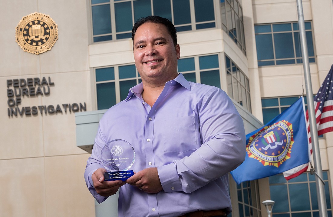 Tommy Desquitado, senior cybersecurity architect for Palo Alto Networks in Jacksonville, received the FBIâ€™s 2017 InfraGard Meeting the Challenge Award.