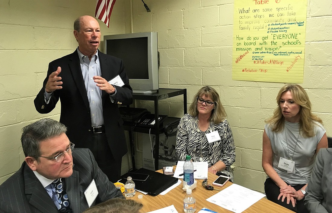 Second from left, Jerry Mallot, president of JAXUSA Partnership and executive vice president of JAX Chamber, takes part in a networking session  to discuss how Executive PASS partnerships can improve education.