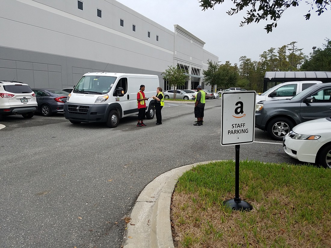 Vans lined up Monday morning outside the Amazon delivery station at 11084 Cabot Commerce Circle in Alta Lakes Commerce Center. The station is off Interstate 295 near Alta Drive and the St. Johns River Power Park.