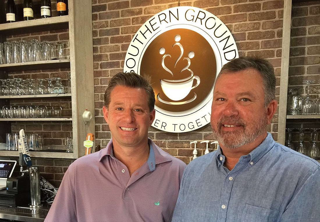 Southern Grounds Coffee LLC partner Mark Janasik and landlord Edward Skinner Jones in the Neptune Beach shop. They plan to add a second location in San Marco.