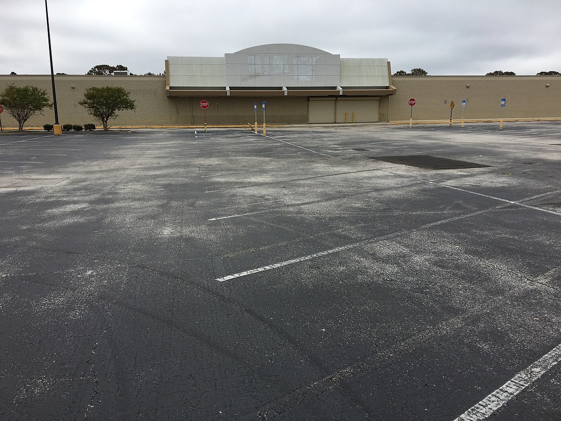 Apartments and retail could replace the aging, vacant Neptune Beach strip mall formerly anchored by Kmart.