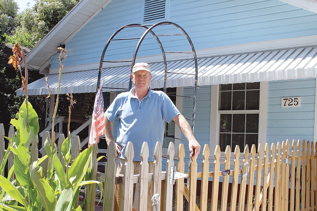 Paul Gruenther stands in front of his home on Escambia Street in the Norwood section of Jacksonville. He spent 10 months rehabbing the property.