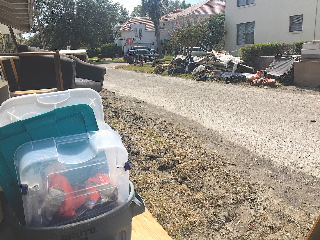 Irma debris is piled on the roadside in San Marco.
