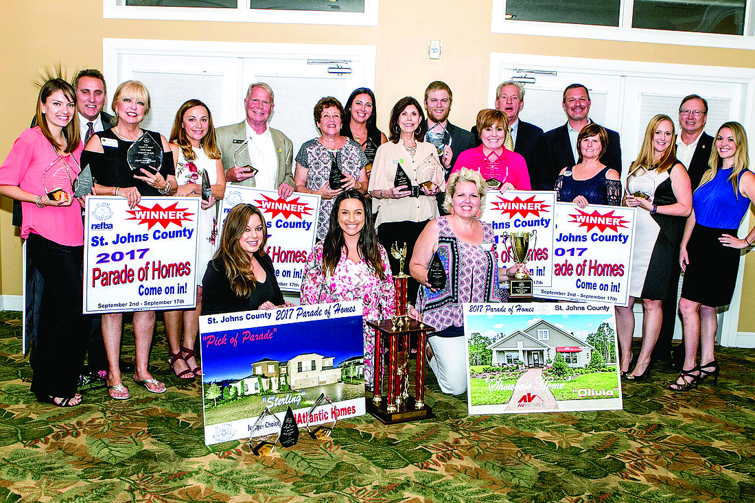 The winners of the SJBC 2017 Parade of Homes celebrate after months of hard work and a very successful event that drew hundreds of potential owners of new homes  from St. Johns and surrounding counties.