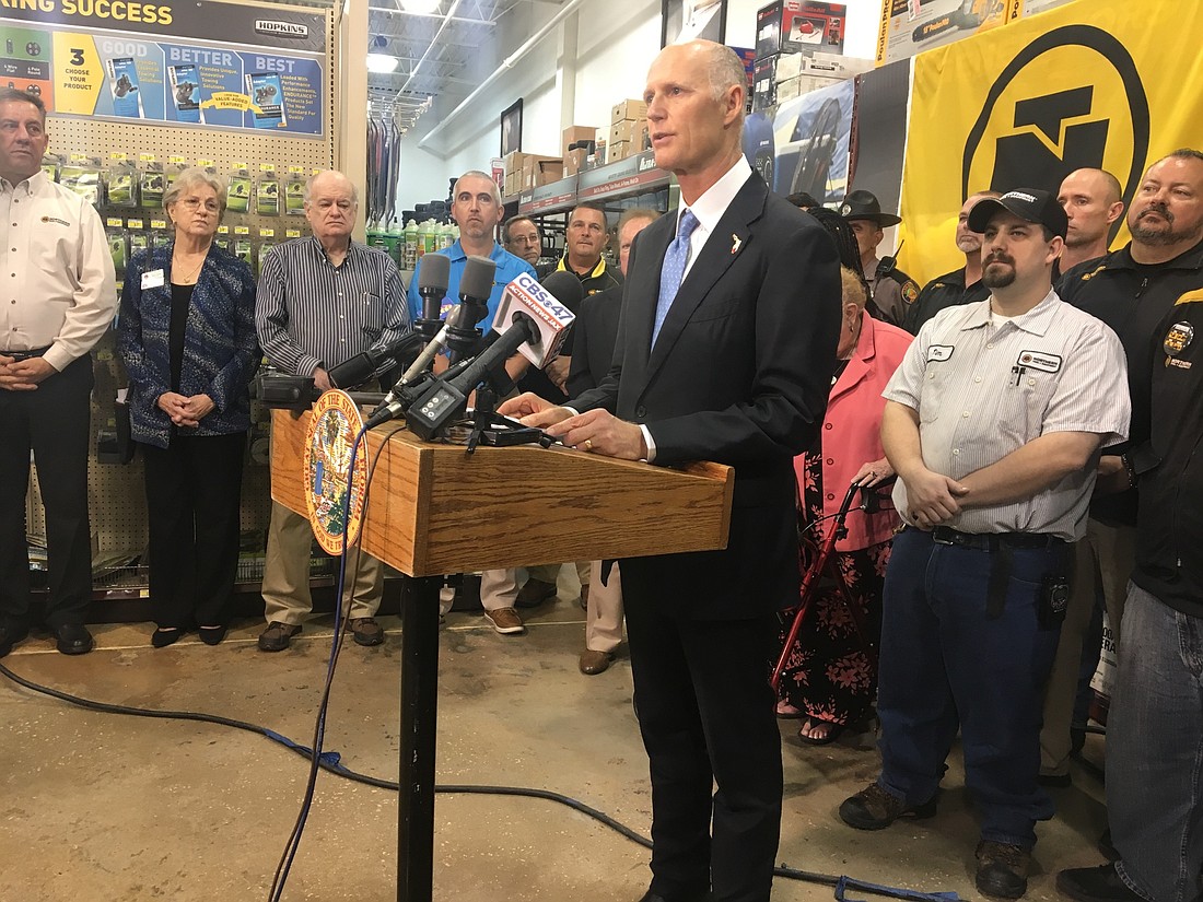 Gov. Rick Scott announced his final budget Tuesday at Northern Tool + Equipment in Arlington.