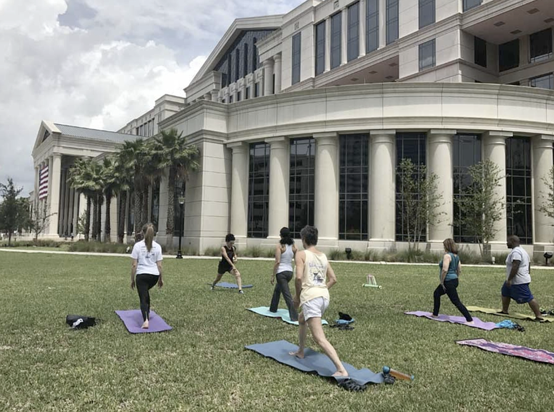 Yoga on the Lawn at the Duval County Courthouse.
