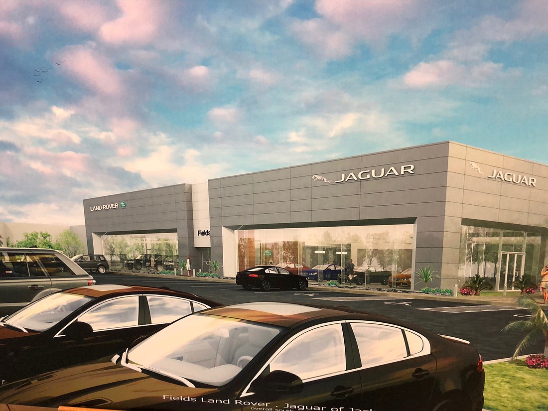A rendering of the new Fields Jaguar Land Rover Jacksonville showroom. The manufacturer launched the â€œArchâ€ concept of design to build the â€œdualedâ€ dealerships in conjoined structures.